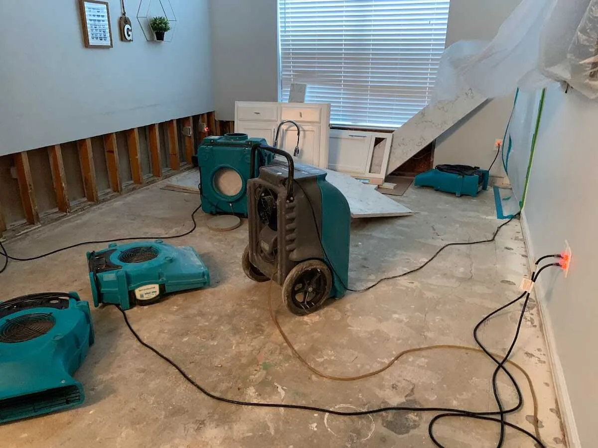 Dehumidifier in flood-cut room for Water Damage Restoration in Seffner